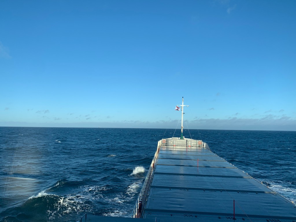 view of the ship from the bridge while sailing in strong winds