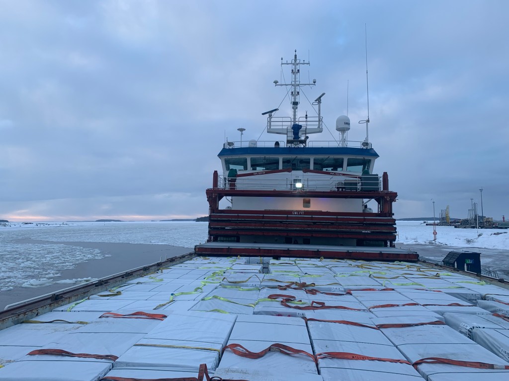 View of the cargo hold fully loaded with timber, it is time to close the hatches and prepare for the deck cargo.