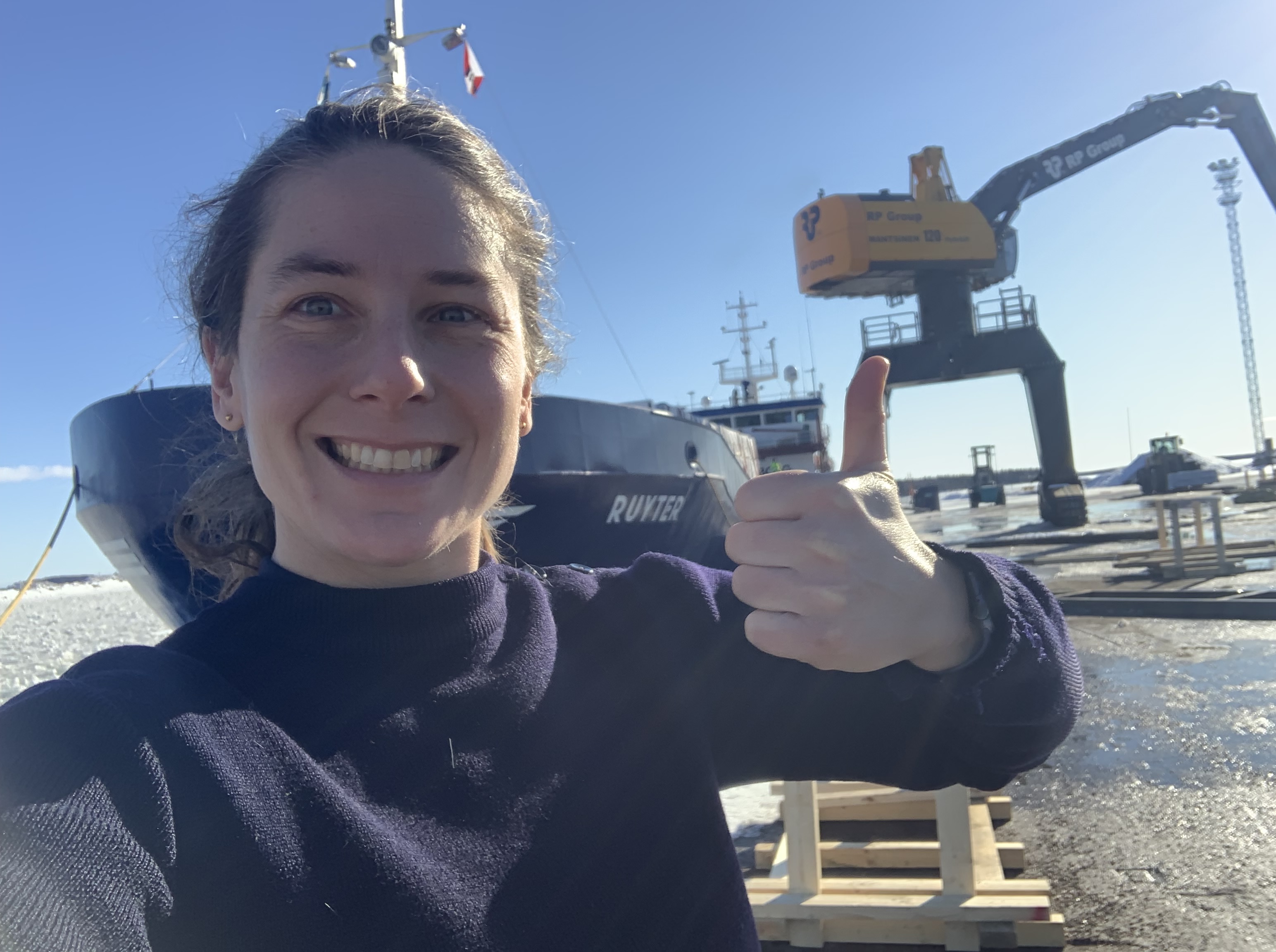 The sun is out again, and chief officer Sophie is checking the drafts on the quay